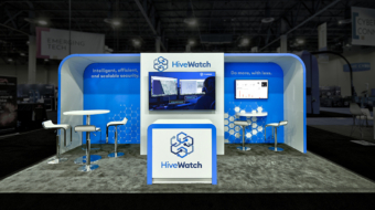a booth with a blue wall and white text